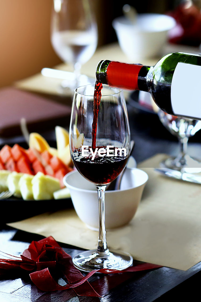 Close-up of wineglass on table