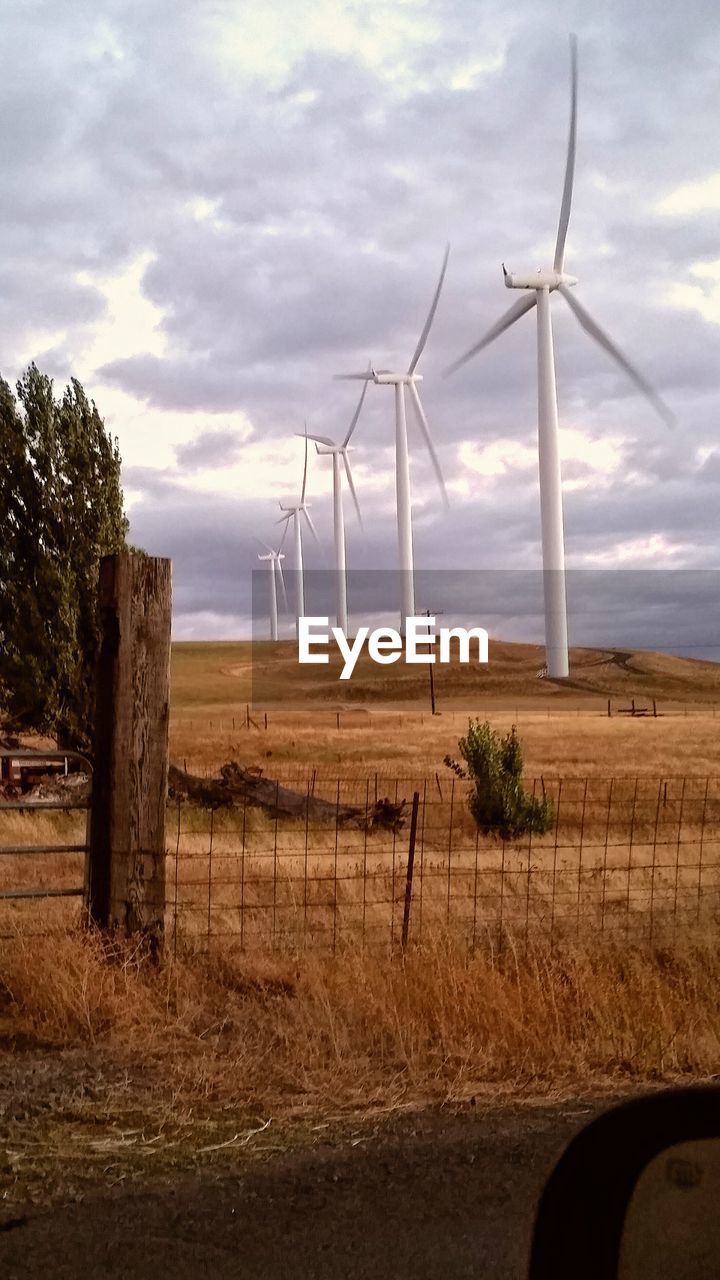 WIND TURBINES ON FIELD