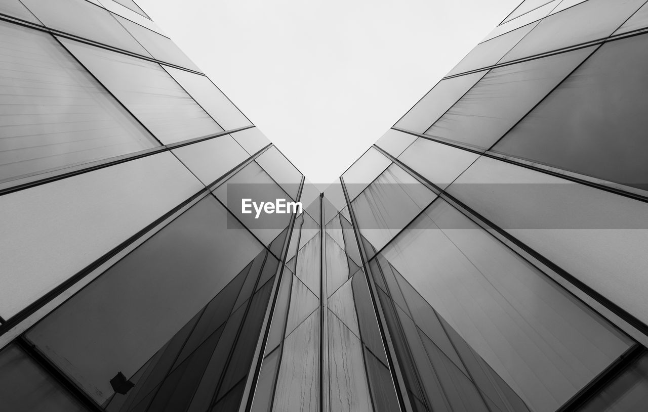 Low angle view of modern building against clear sky