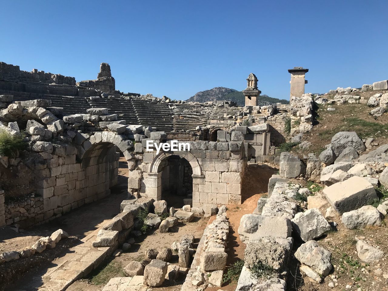 Old ruins against clear blue sky