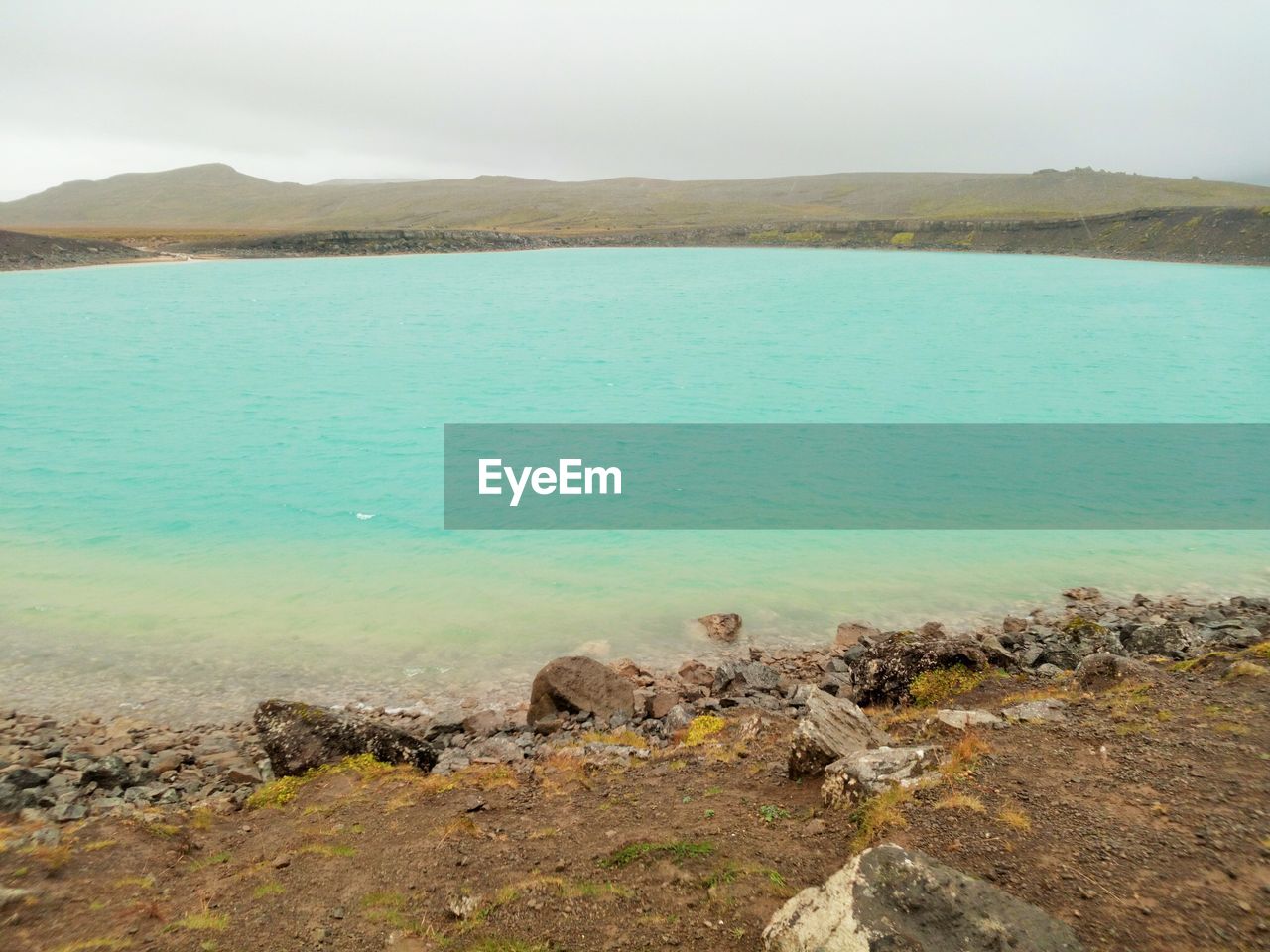 Scenic view of lake against clear sky