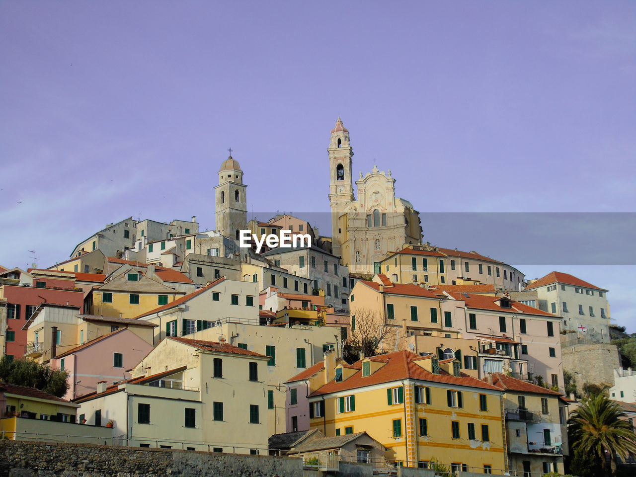 View of buildings in city against sky