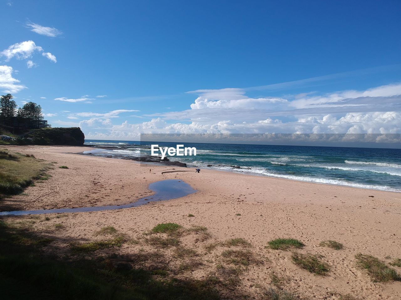 Scenic view of beach against sky