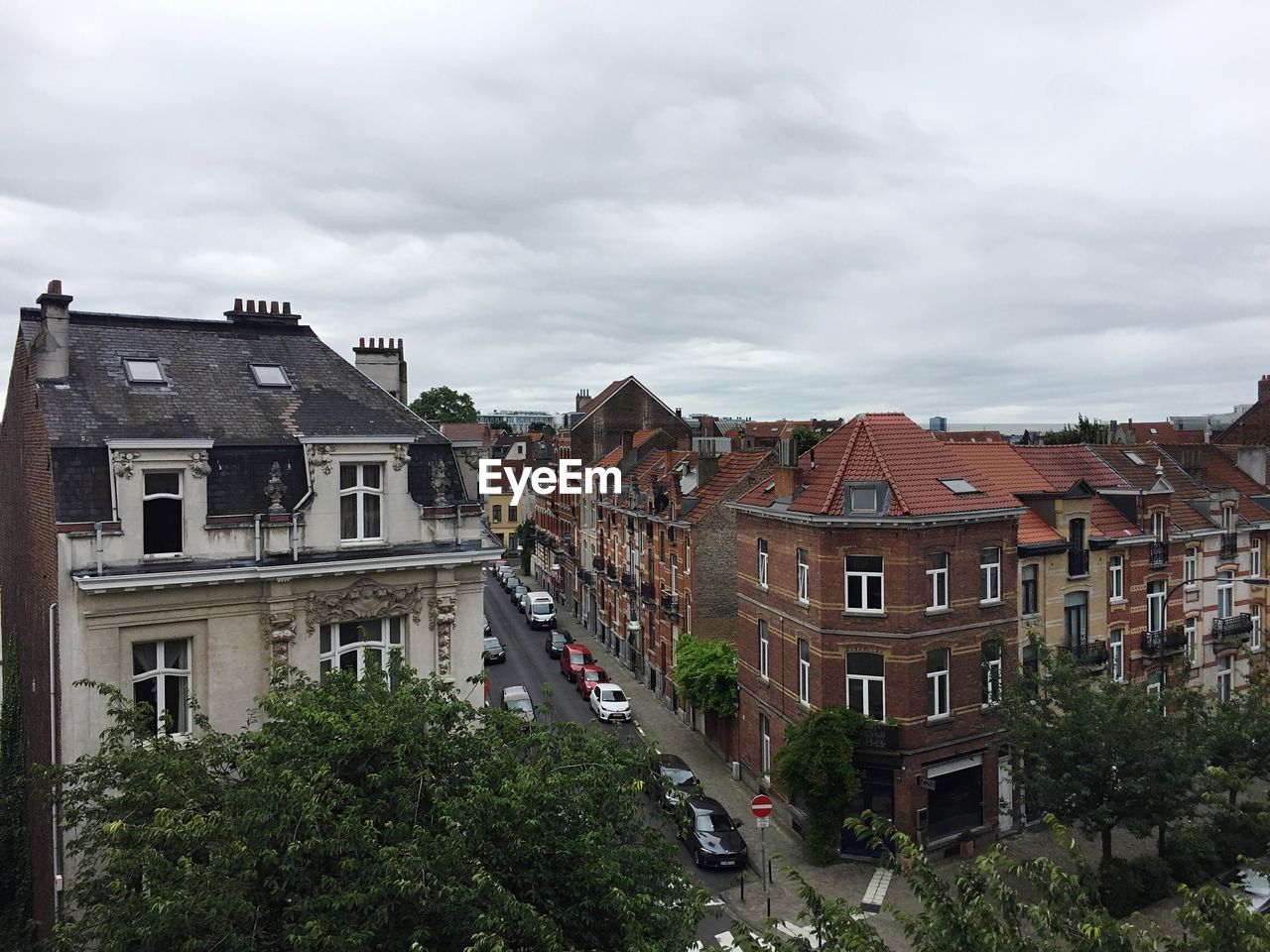 Houses against sky in city