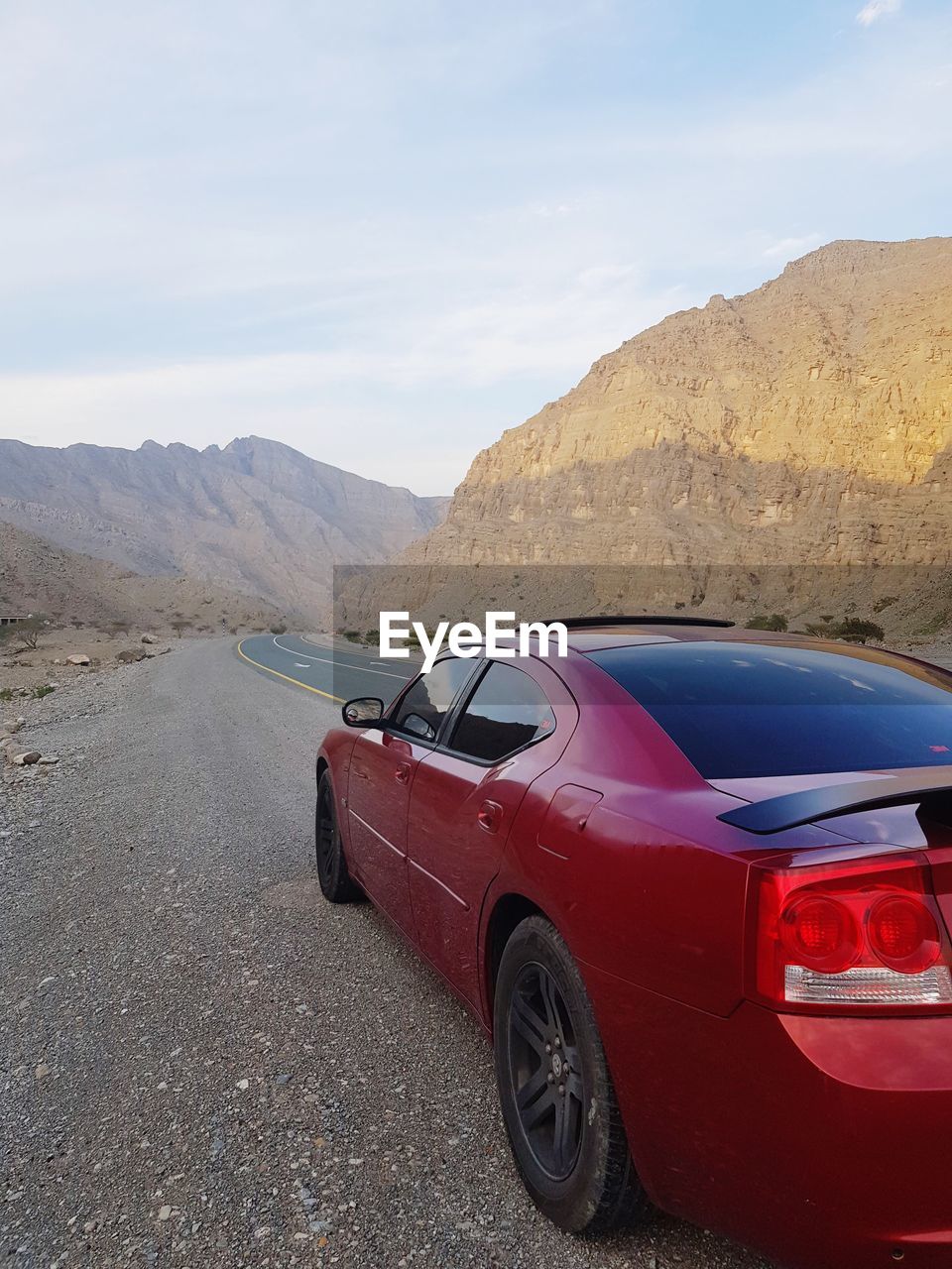 CAR ON MOUNTAIN ROAD