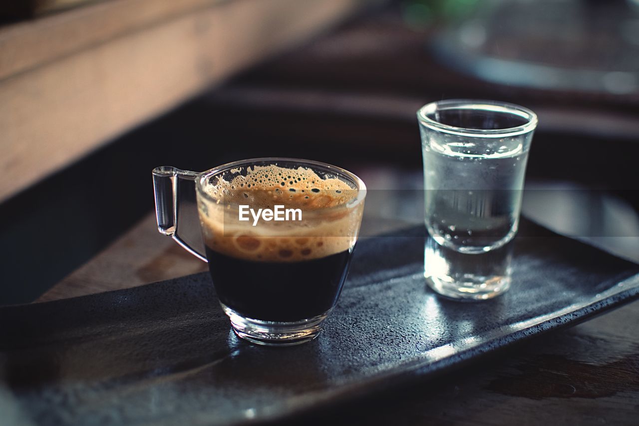 Close-up of coffee cup on table