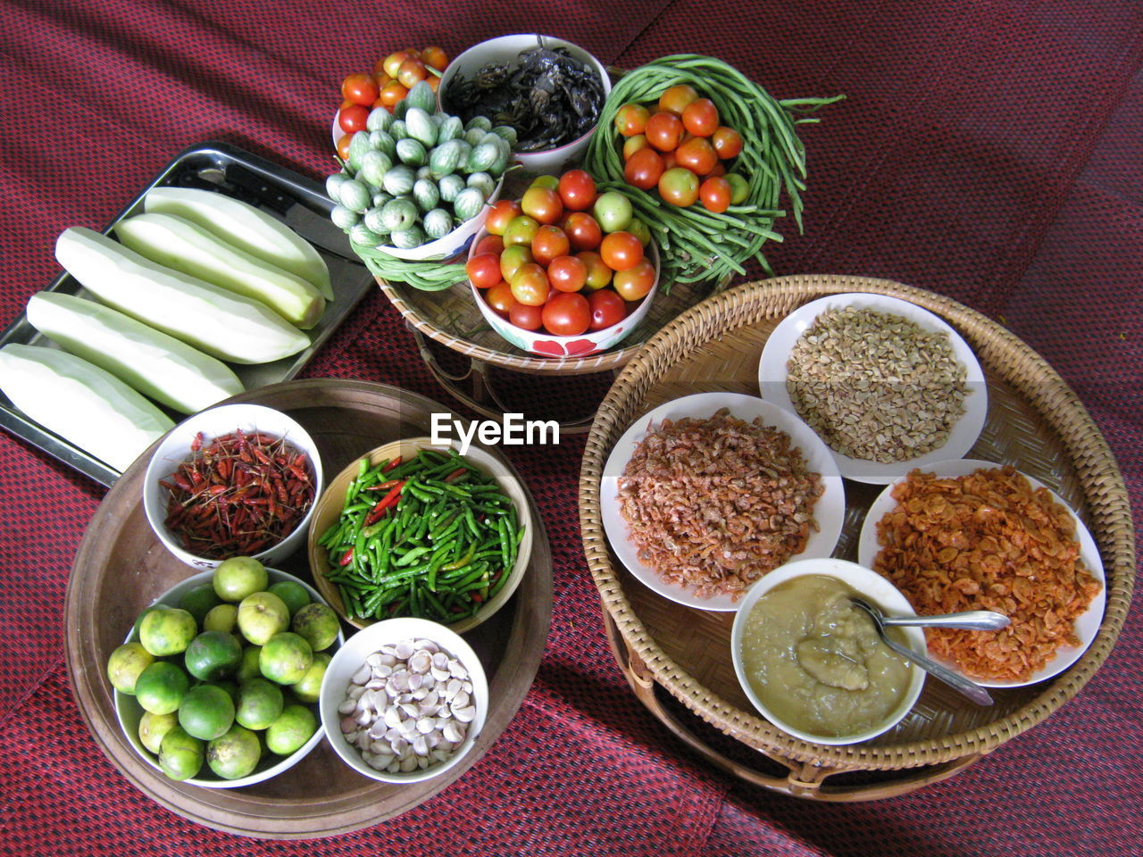 High angle view of vegetables and ingredients on table