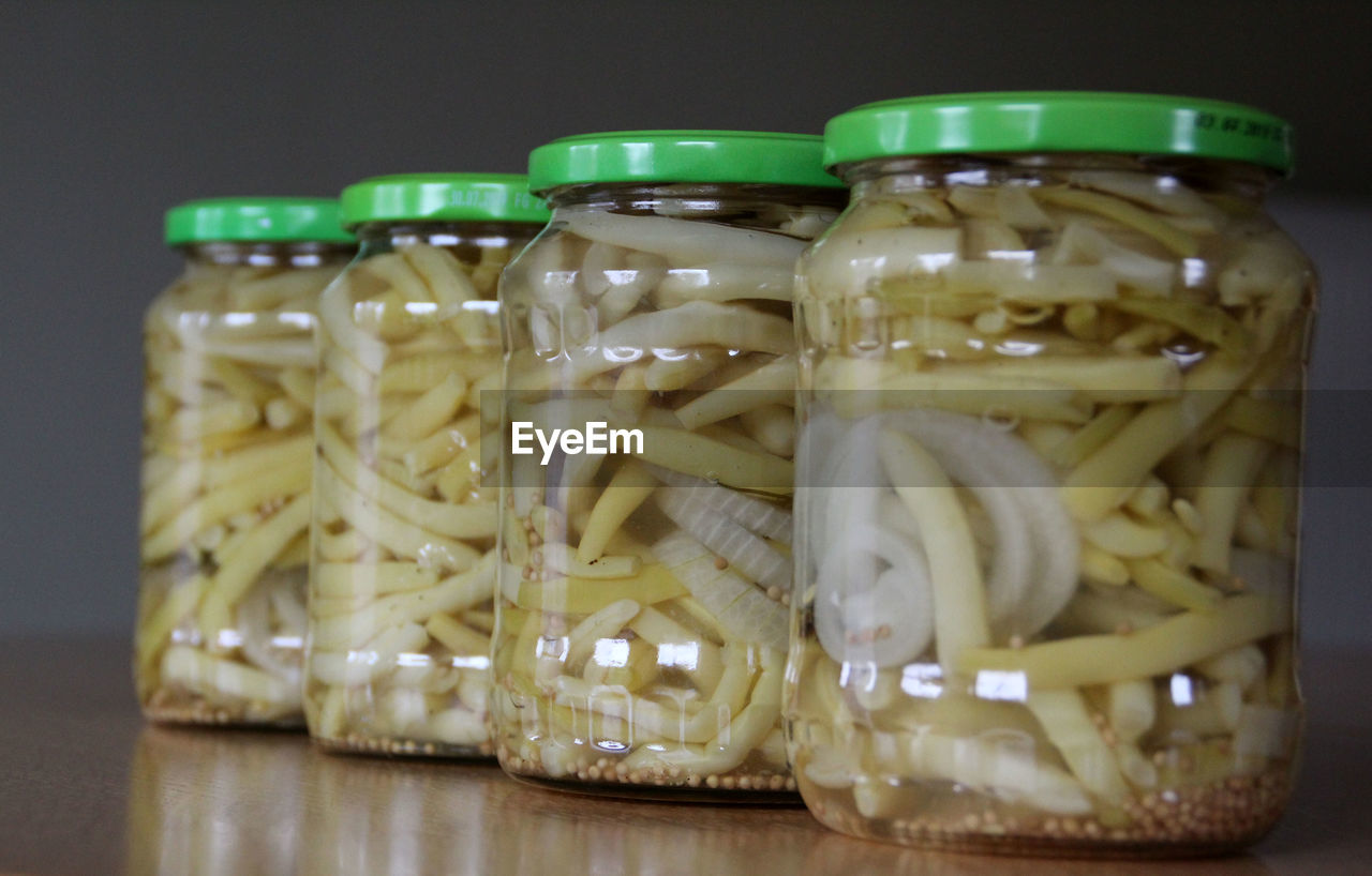 Close-up of food in jars on table