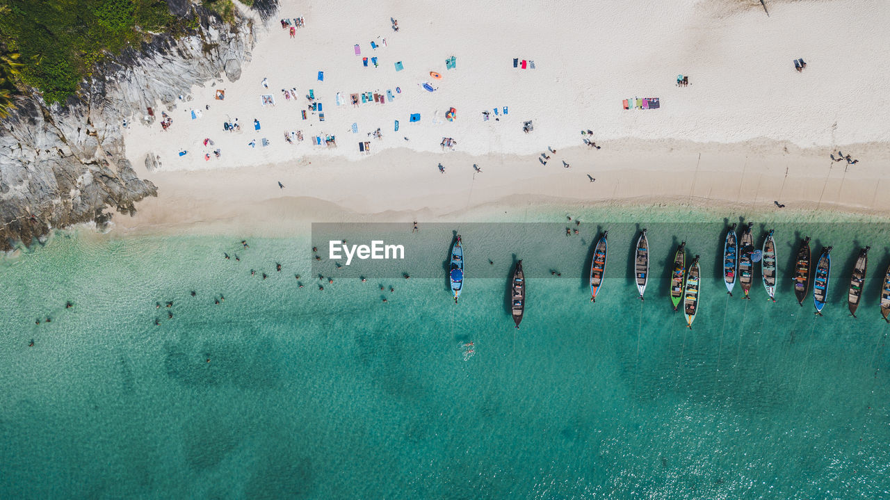 High angle view of people on sea shore