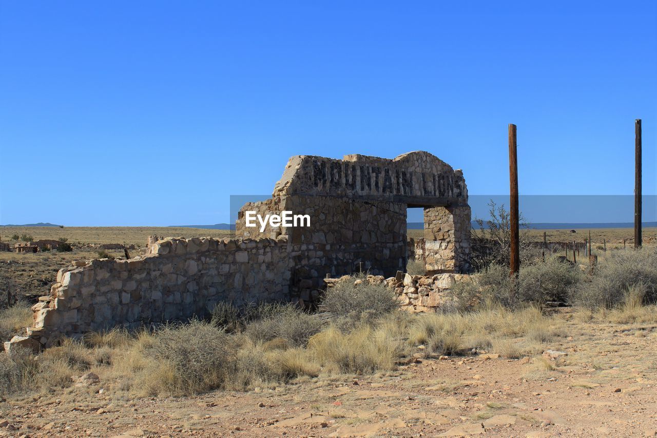 Low angle view of ruins against clear sky