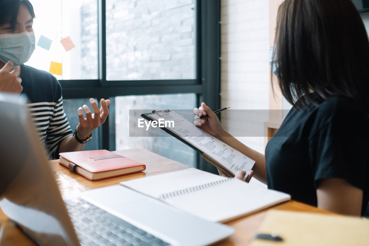 Business people discussing in office