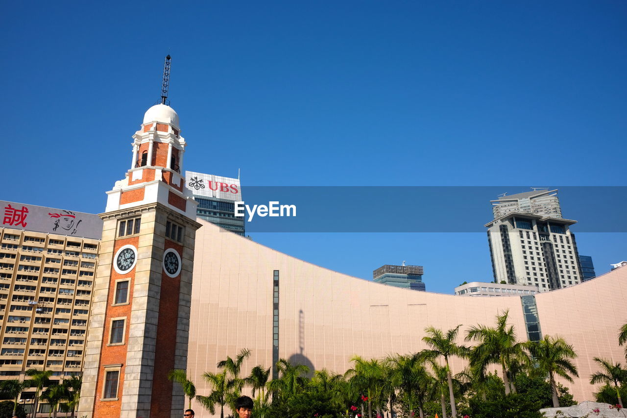 LOW ANGLE VIEW OF CATHEDRAL AGAINST BLUE SKY