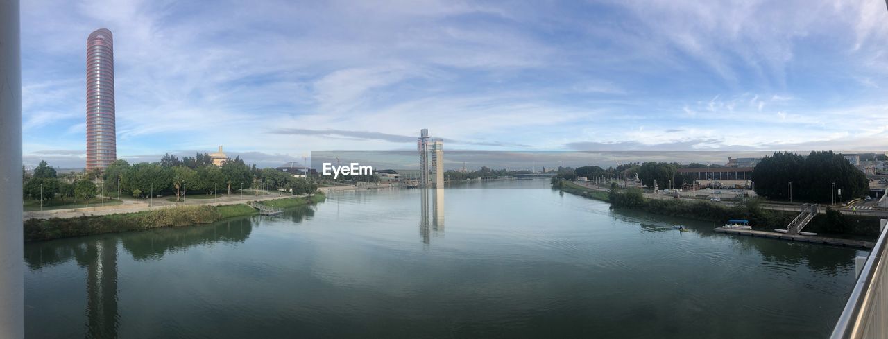 VIEW OF BRIDGE OVER RIVER AGAINST SKY