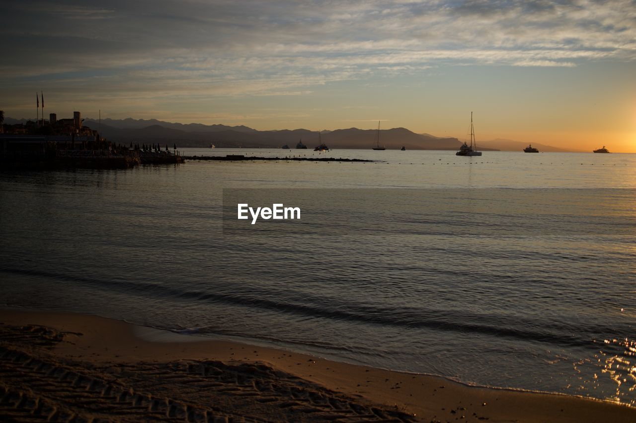 SCENIC VIEW OF SEA DURING SUNSET