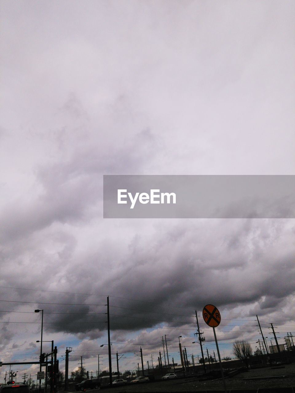 LOW ANGLE VIEW OF CLOUDY SKY AT SUNSET