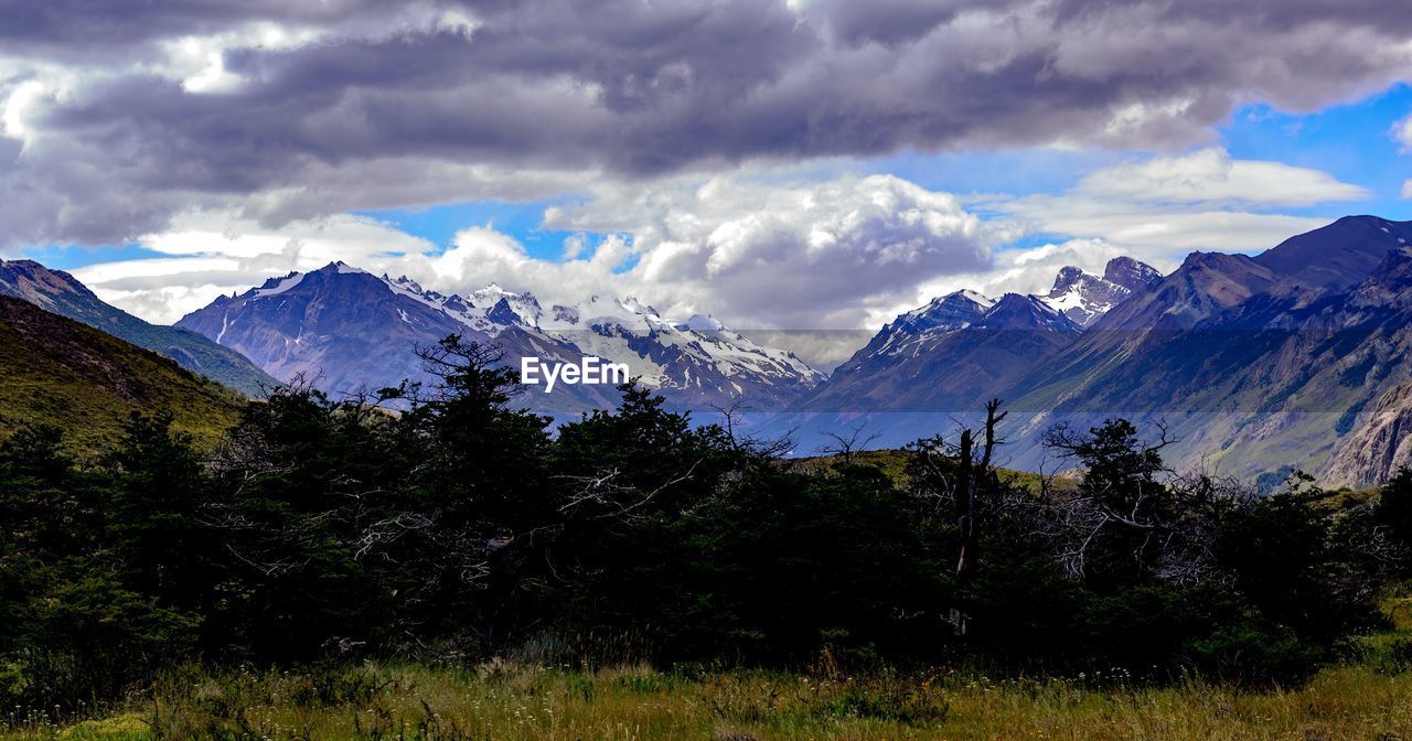 SCENIC VIEW OF MOUNTAIN AGAINST SKY