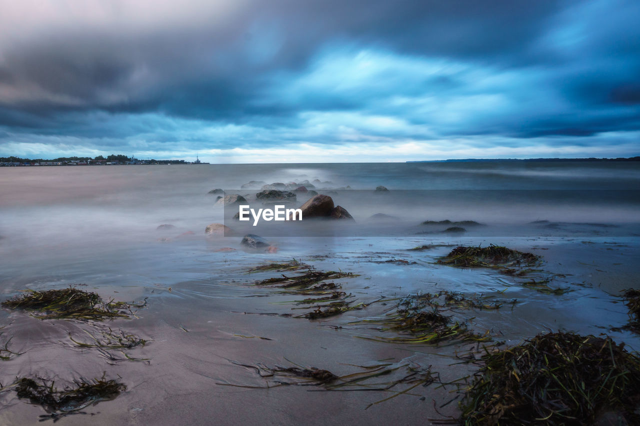 Scenic view of beach against sky