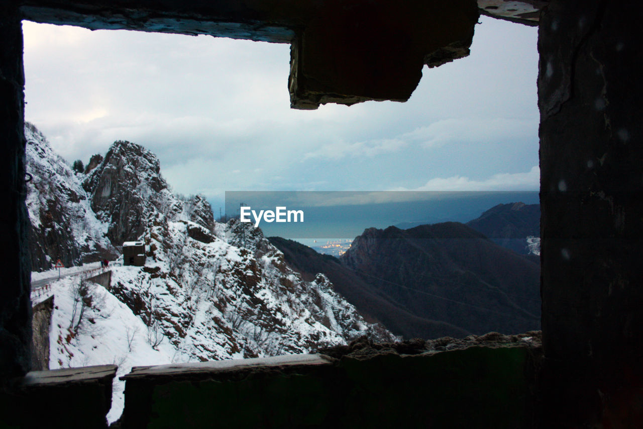 SCENIC VIEW OF MOUNTAINS DURING WINTER