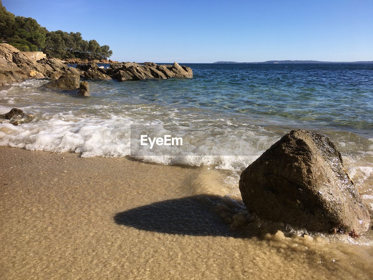 Scenic view of sea against clear sky