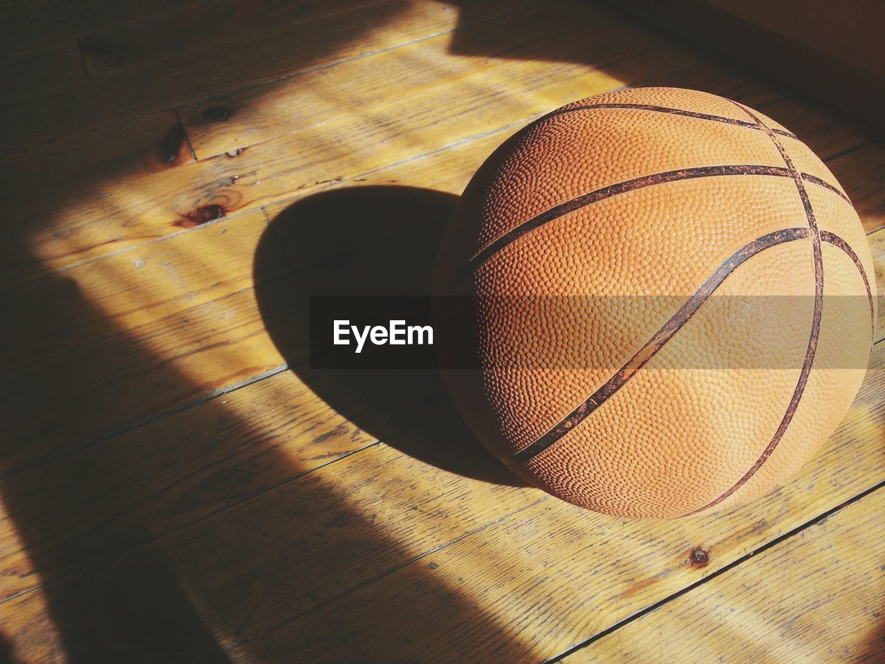 High angle view of basketball on floorboard