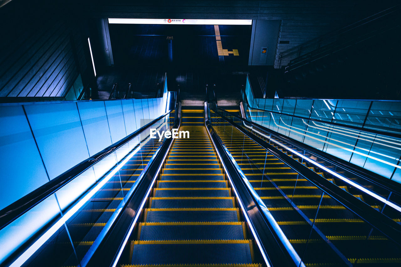 Low angle view of escalator at subway station