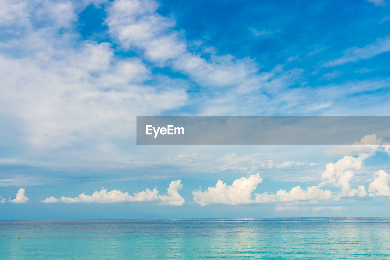 SCENIC VIEW OF SEASCAPE AGAINST SKY