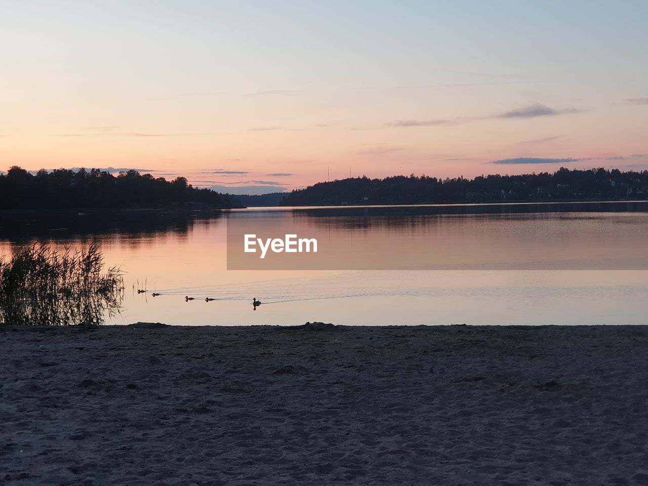 VIEW OF LAKE AT SUNSET