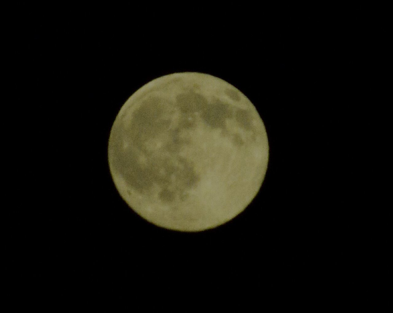 LOW ANGLE VIEW OF MOON IN SKY