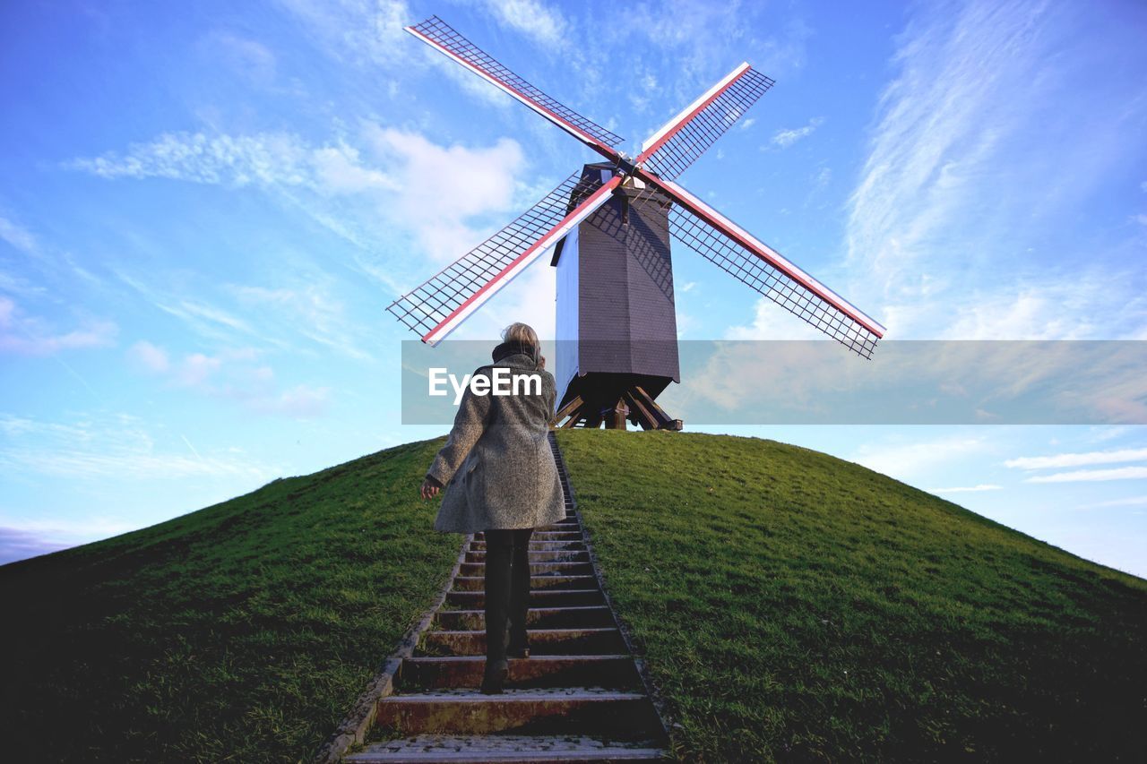 LOW ANGLE VIEW OF TRADITIONAL WINDMILL AGAINST SKY