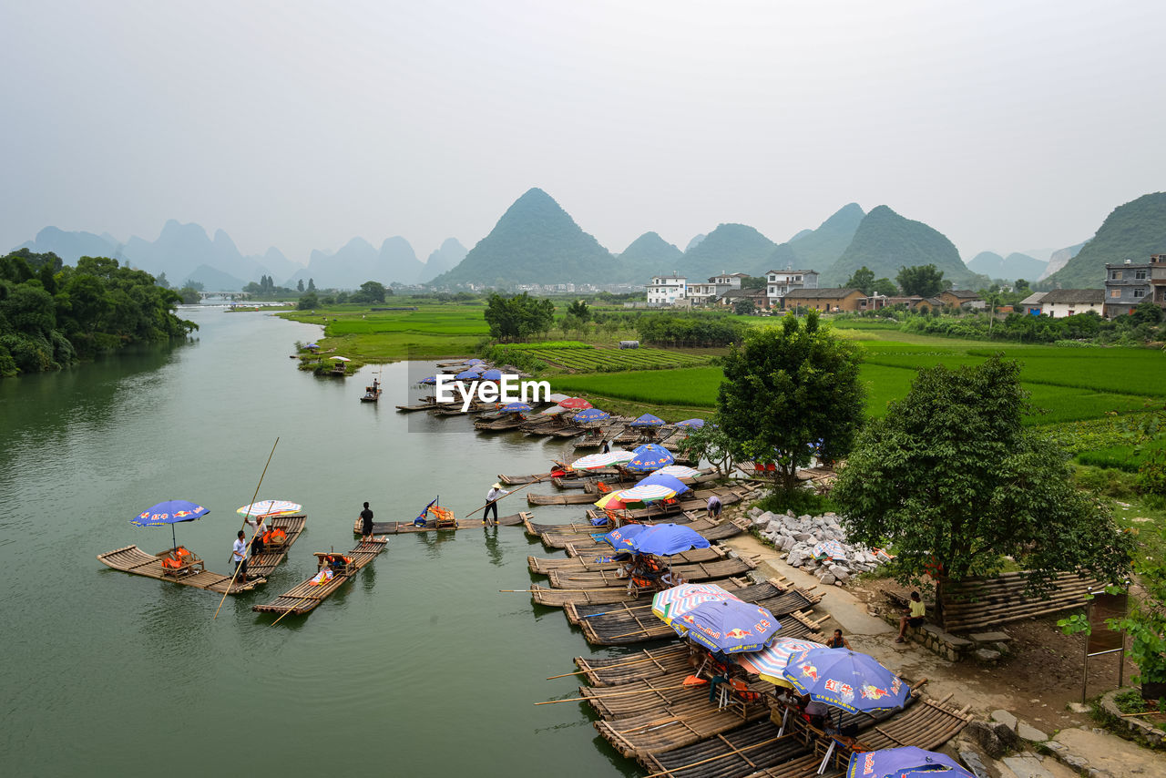 Yangshuo landscape with river and rafts 