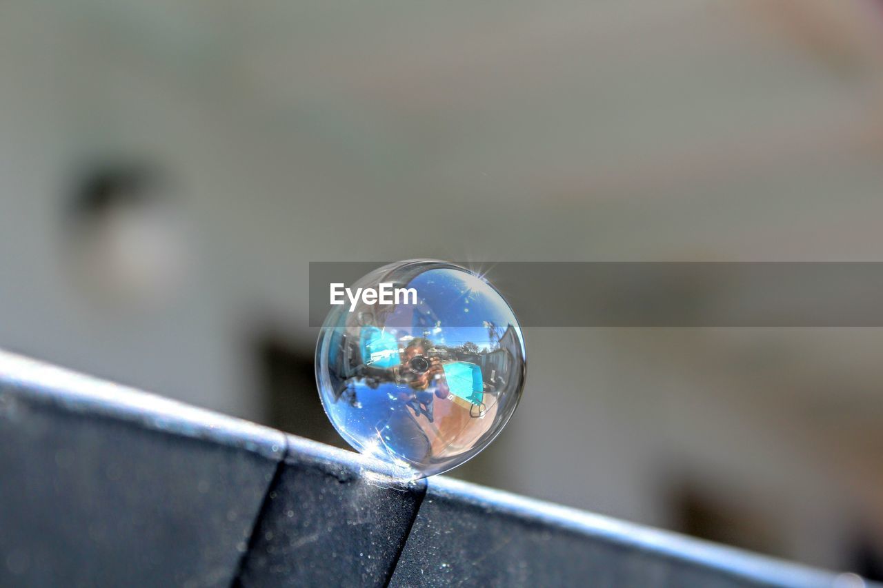 CLOSE-UP OF BUBBLES ON CRYSTAL