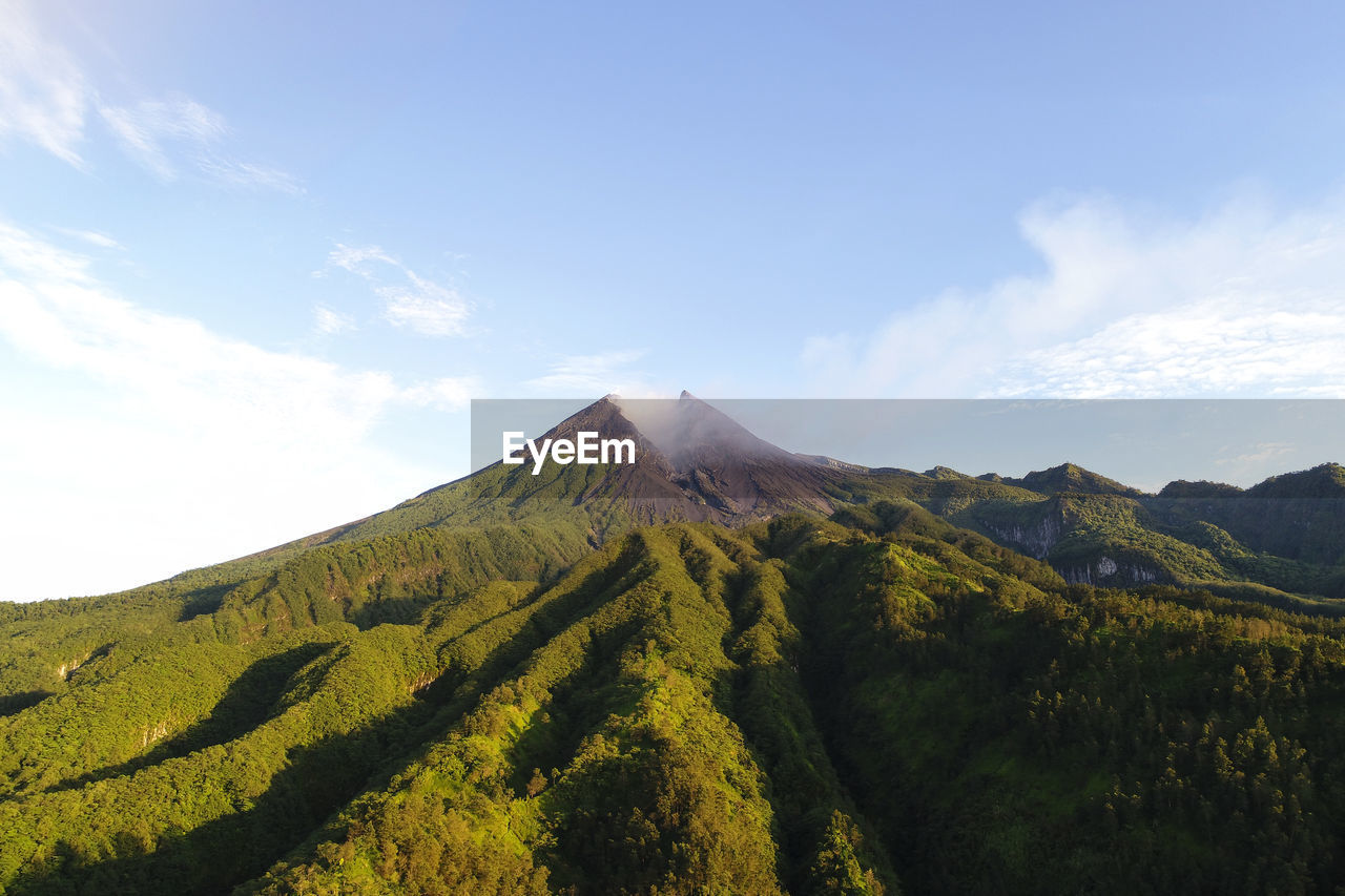 Scenic view of mountain range against sky