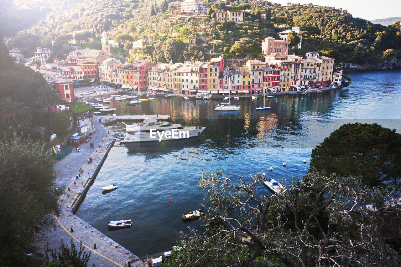 High angle view of townscape by sea