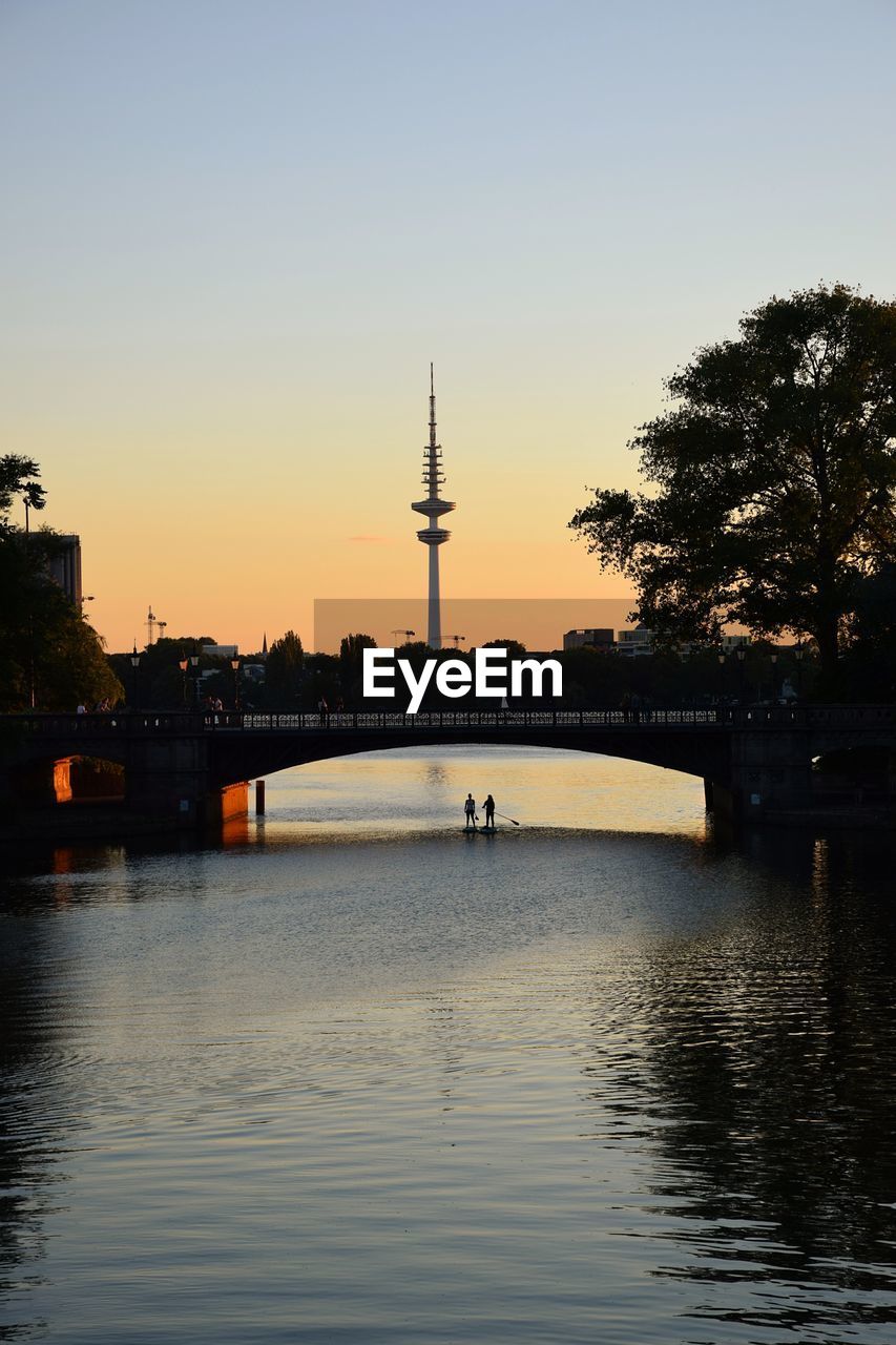 View of bridge over river against sky during sunset