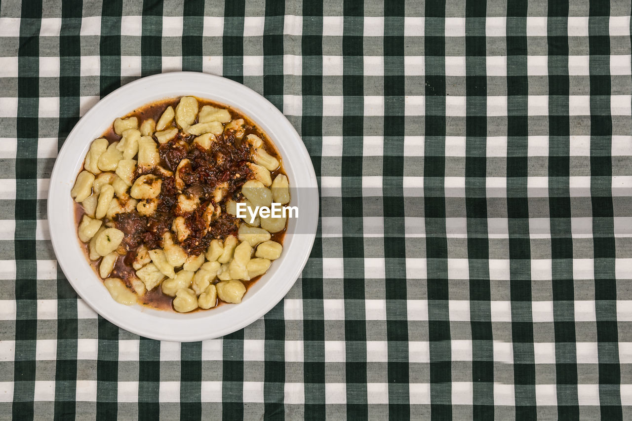 directly above shot of food in plate on jute