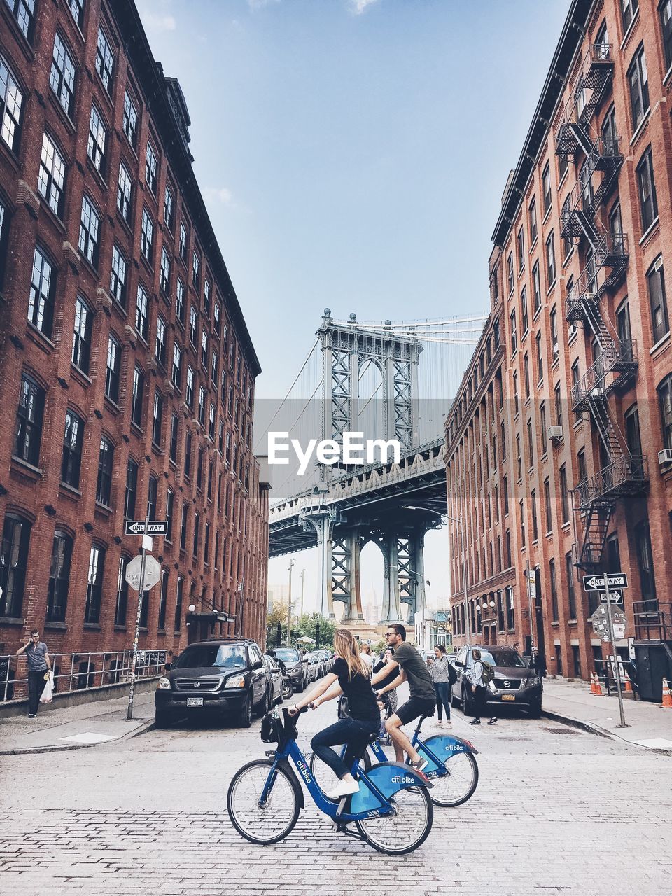 BICYCLES PARKED IN FRONT OF BUILDINGS