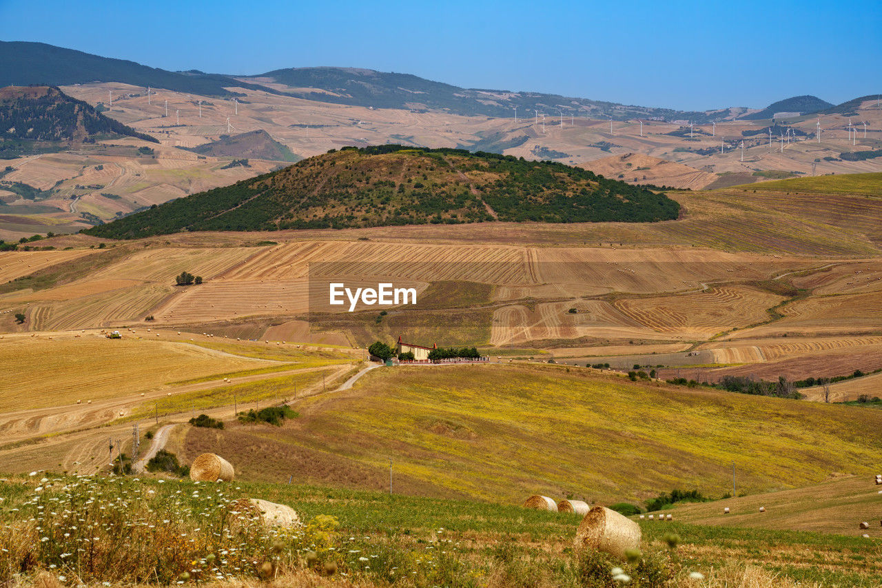 high angle view of agricultural field against mountain