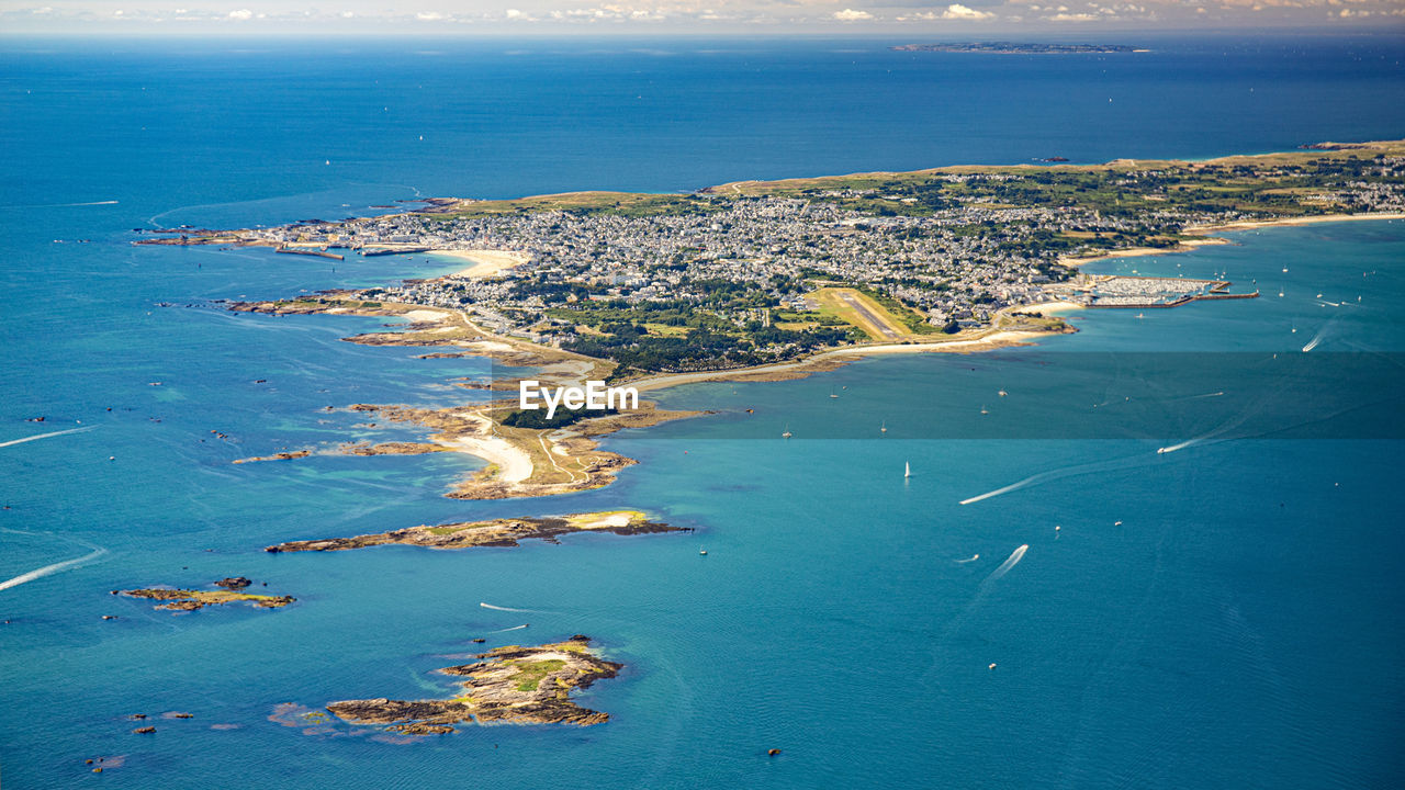 water, sea, ocean, land, coast, beach, horizon, aerial view, nature, blue, scenics - nature, archipelago, aerial photography, island, sky, coastline, travel, travel destinations, environment, beauty in nature, spit, no people, transportation, city, nautical vessel, outdoors, body of water, shore, islet, landscape, high angle view, architecture, bay, day, tranquility, horizon over water, tourism, seascape, trip, vacation, holiday, bay of water, harbor, tranquil scene, cloud, terrain, mode of transportation