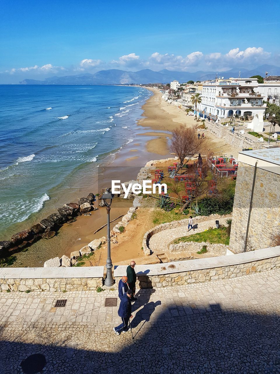 High angle view of people on beach against sky