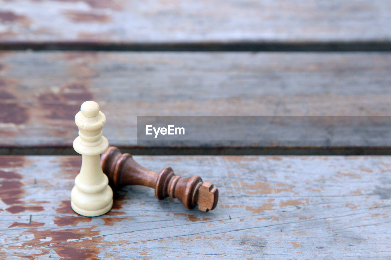 Close-up of chess piece on table