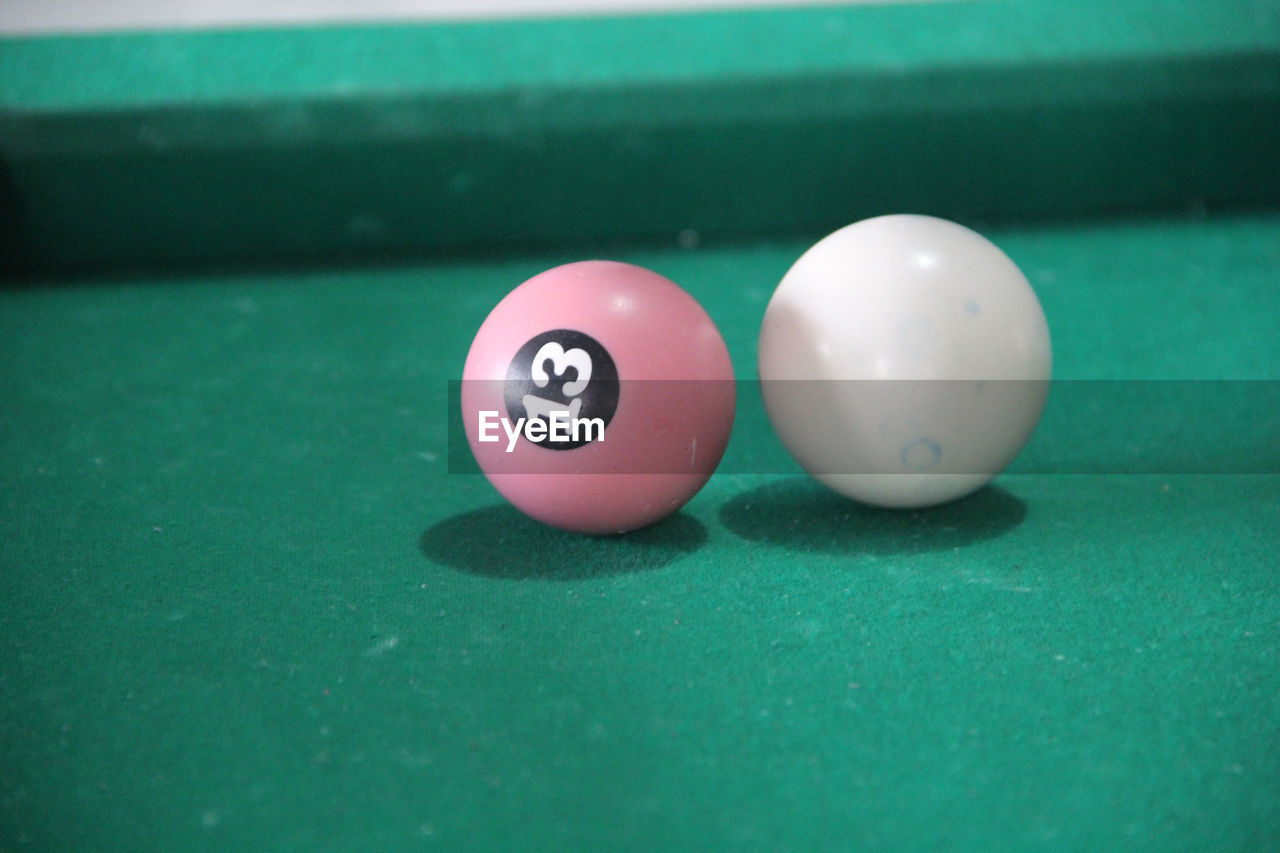 Close-up of pool balls on table