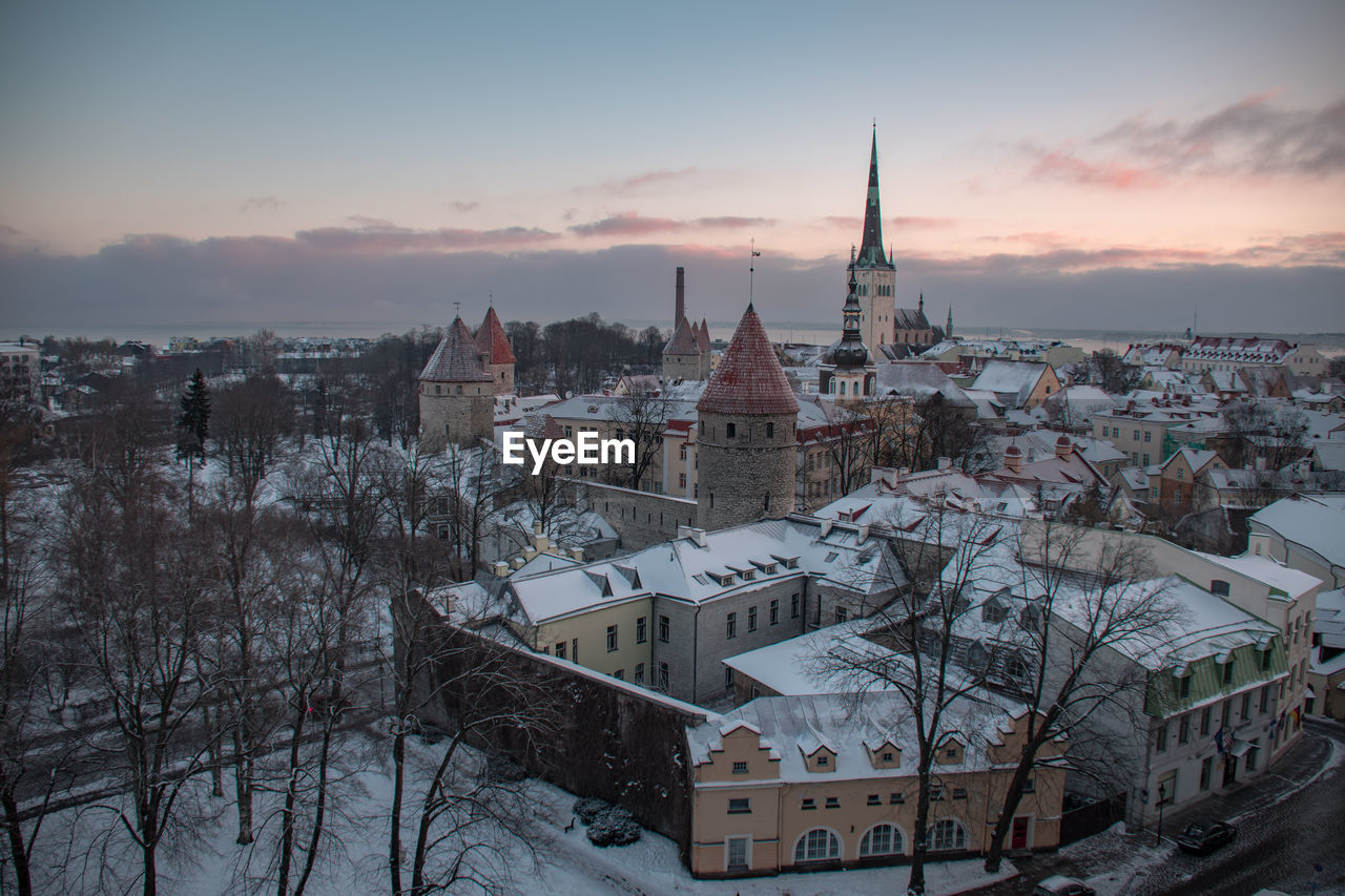 Panoramic view of townscape against sky during sunset