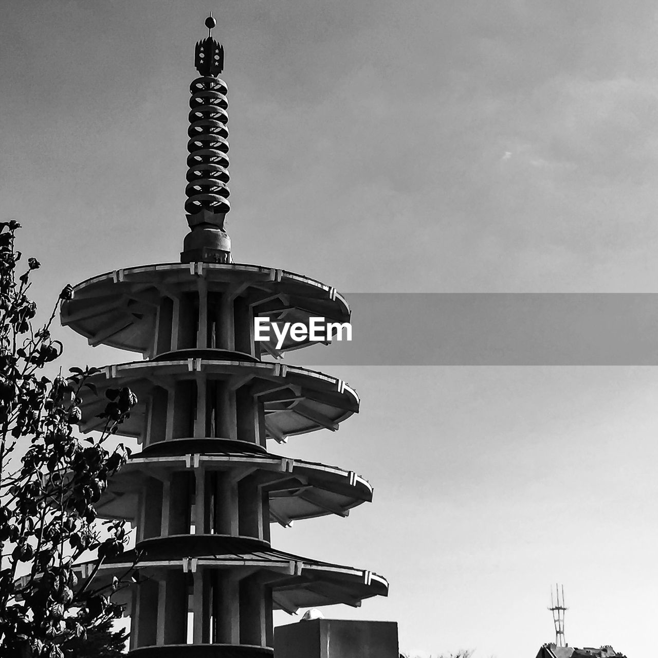 Low angle view of peace pagoda with sutro tower in background against sky