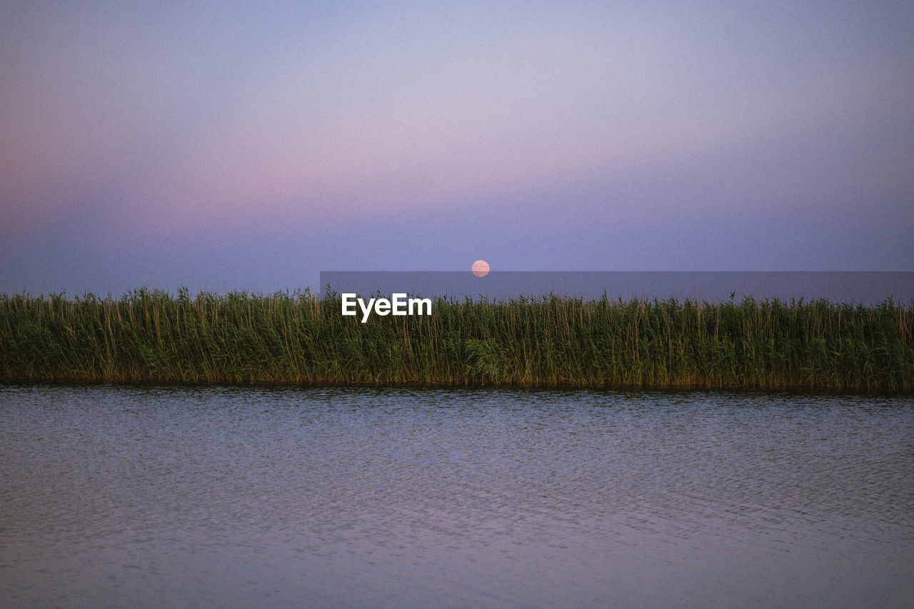 scenic view of lake against clear sky