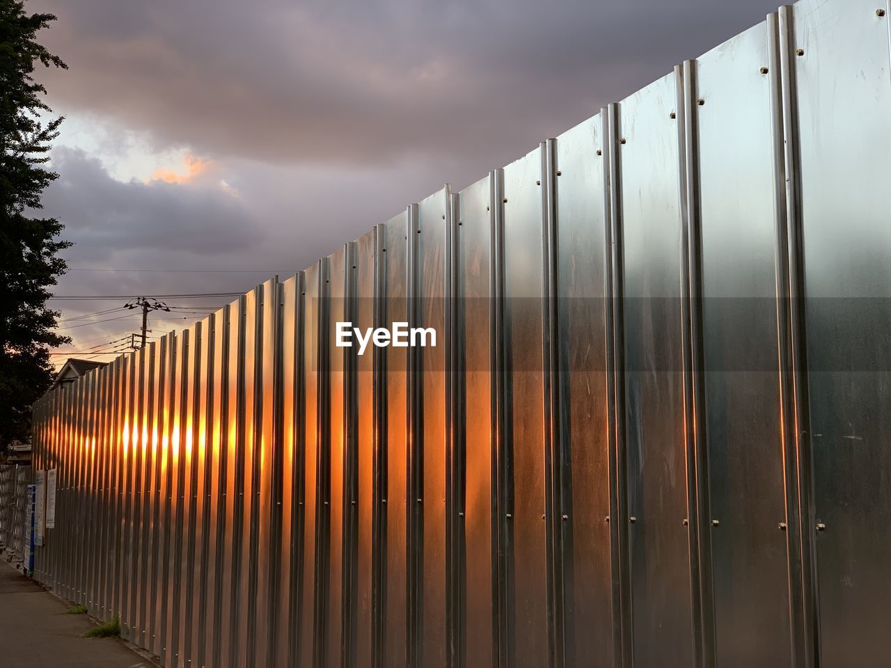View of metallic wall during sunset