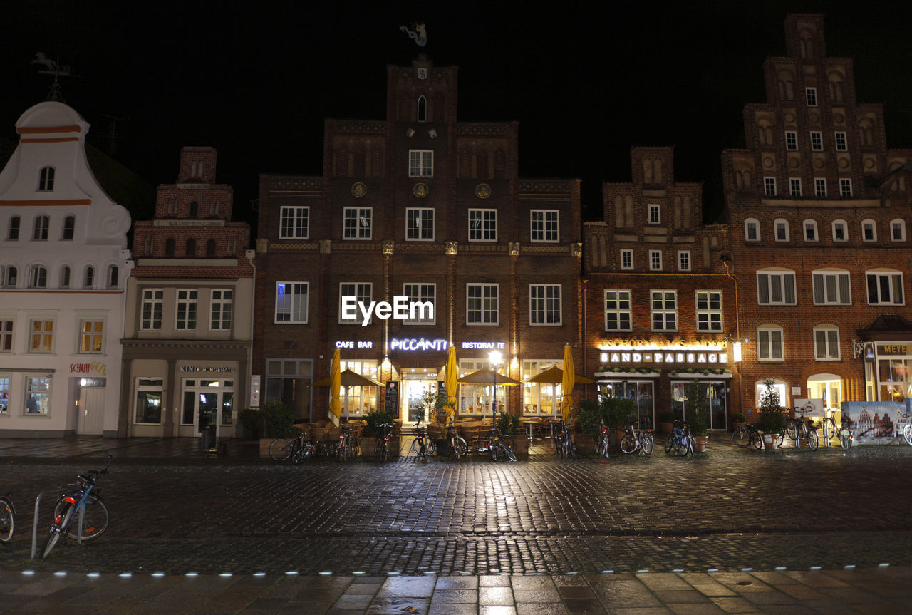 ILLUMINATED BUILDINGS AT NIGHT