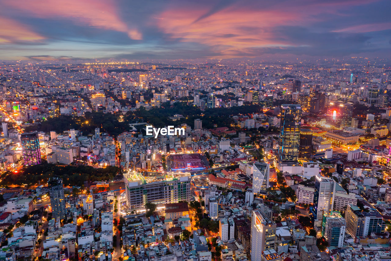 Drone view photo of saigon downtown district in the sunset