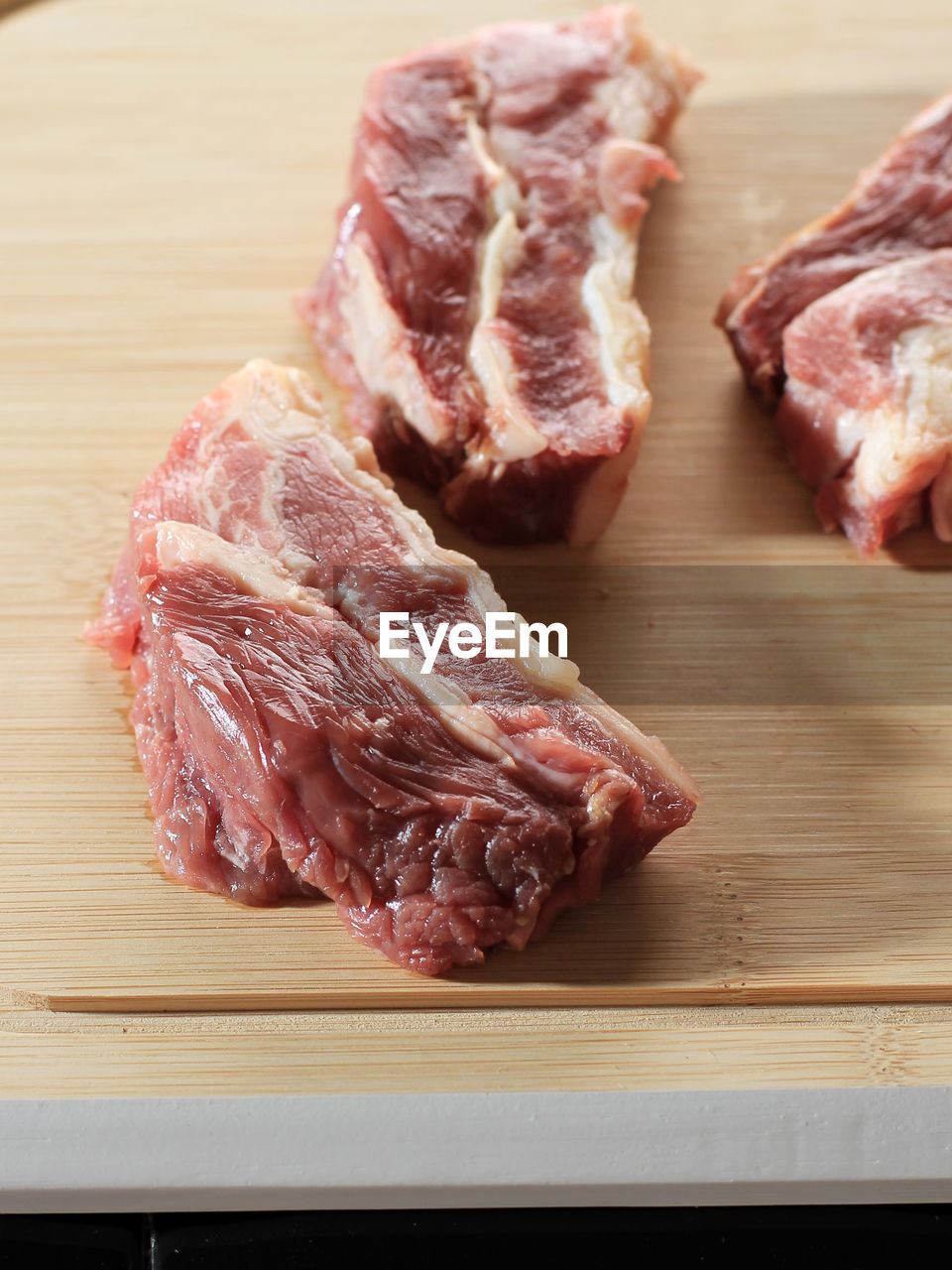 high angle view of meat on cutting board