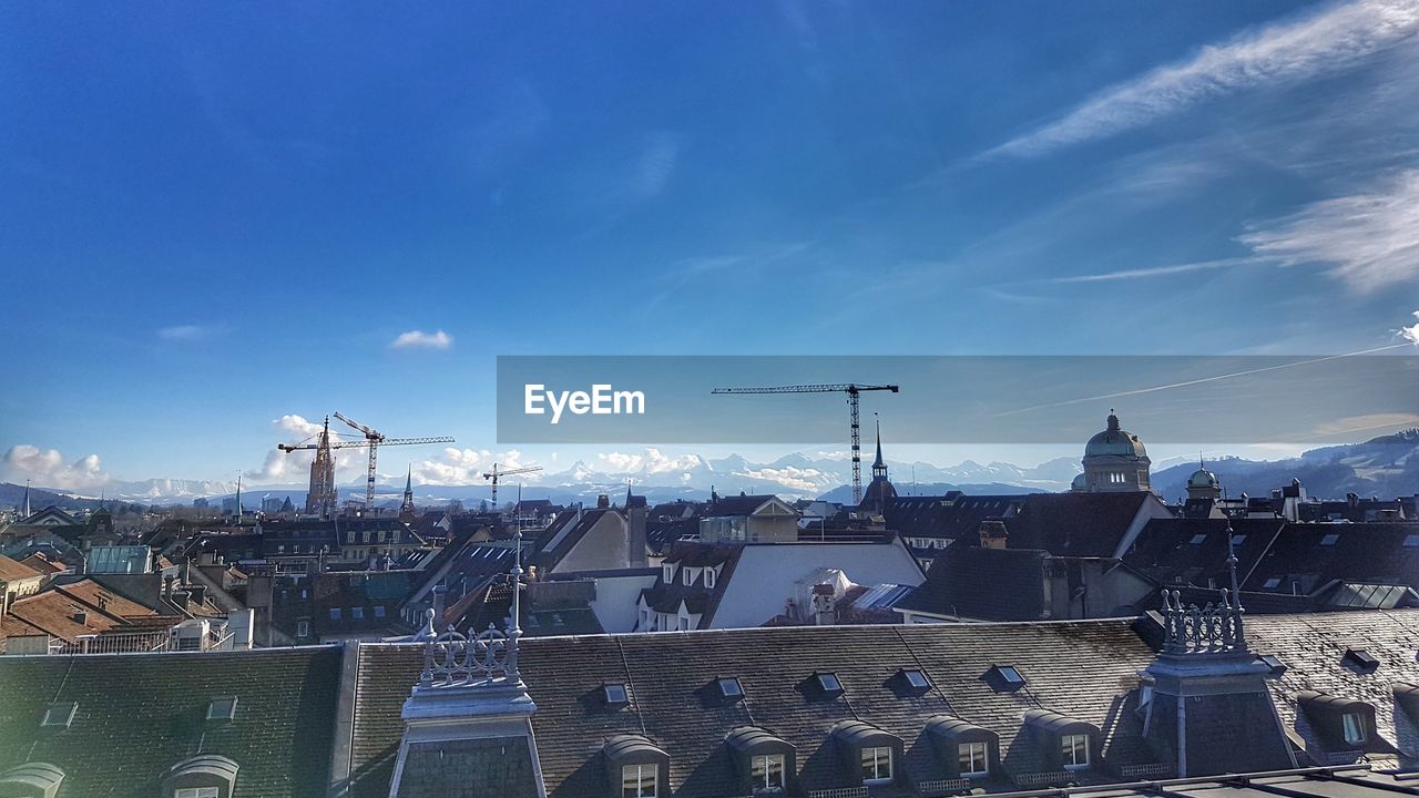 BUILDINGS IN CITY AGAINST SKY