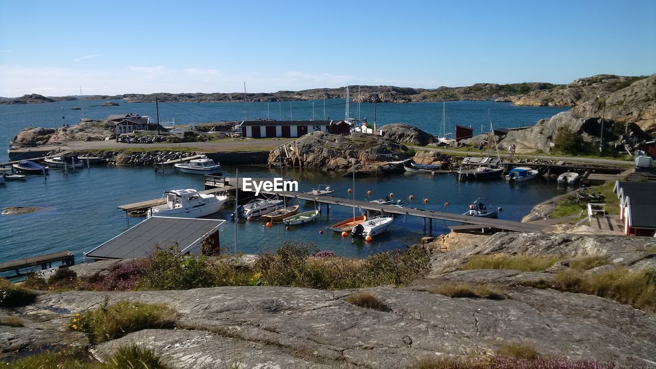 High angle view of boats moored in harbor